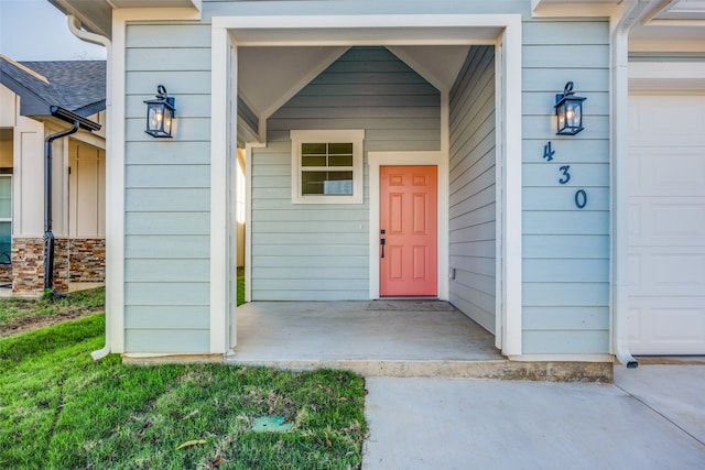 property entrance featuring a garage