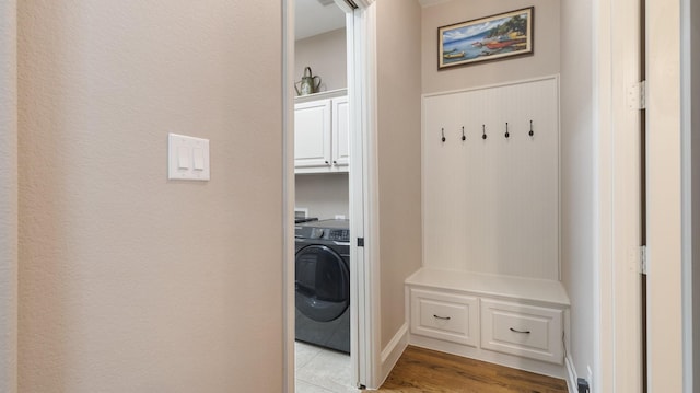 mudroom with washer / clothes dryer and light hardwood / wood-style floors