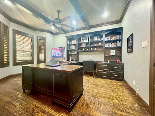 office featuring ceiling fan, beamed ceiling, built in desk, and ornamental molding