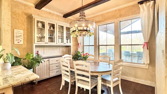 dining area featuring beamed ceiling, dark hardwood / wood-style floors, crown molding, and a notable chandelier