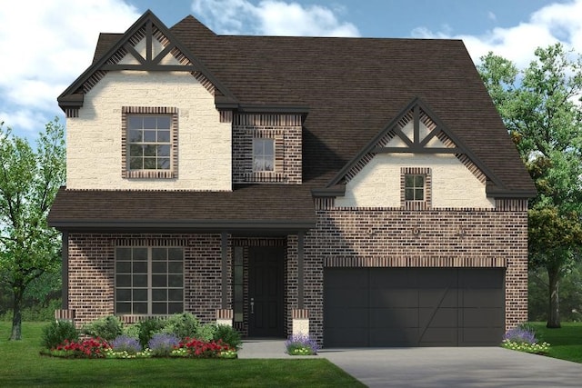 view of front facade with a garage and a front lawn