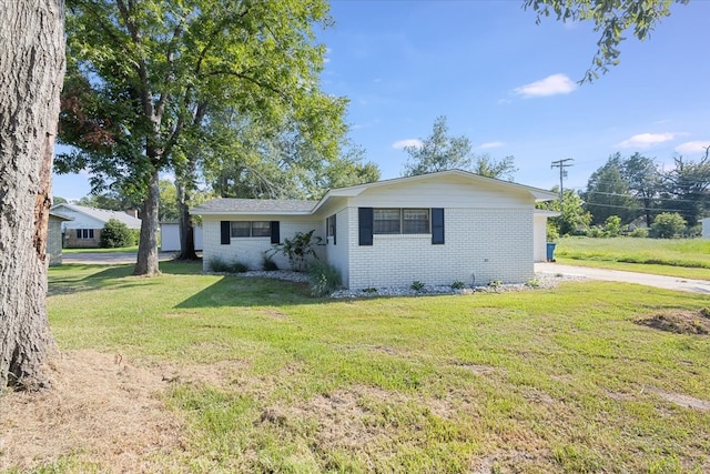 view of front of home with a front yard