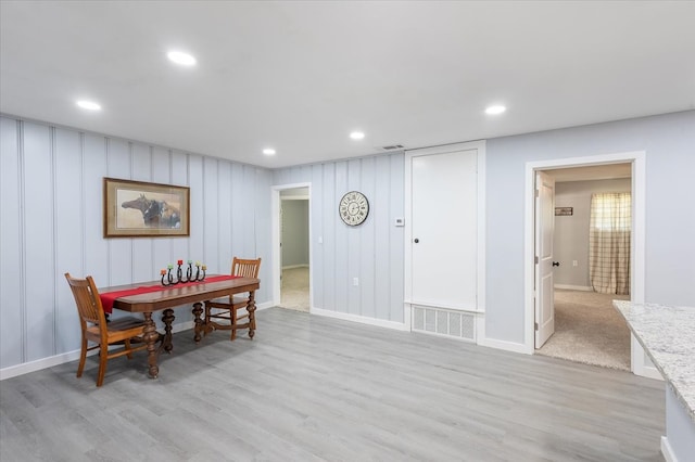 dining area featuring light wood-type flooring