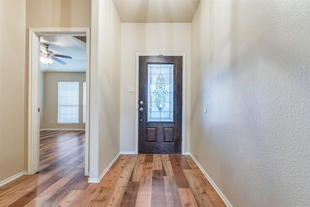 entryway featuring hardwood / wood-style floors and ceiling fan