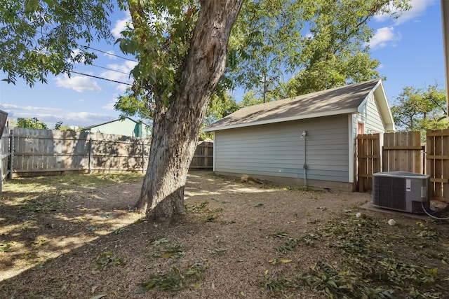 view of yard with central AC