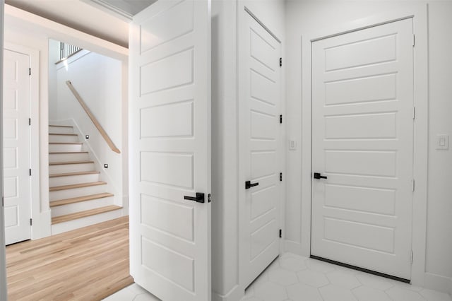 hall with light hardwood / wood-style floors