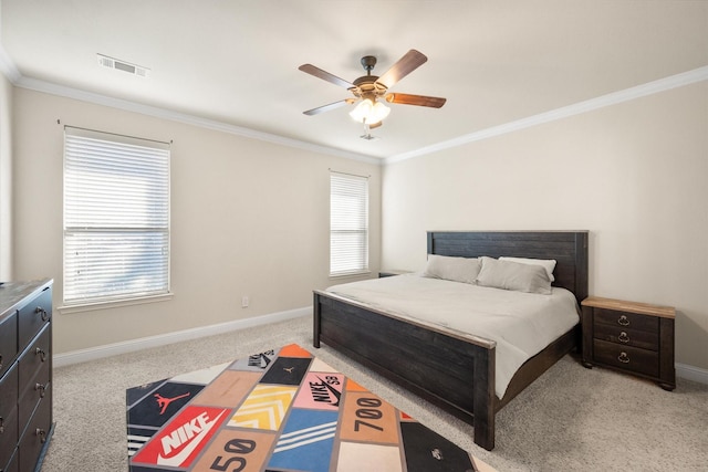 bedroom featuring baseboards, visible vents, multiple windows, and crown molding
