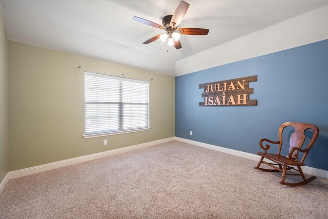unfurnished room with a ceiling fan, carpet, baseboards, and vaulted ceiling