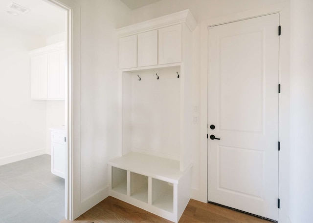 mudroom with light wood-type flooring