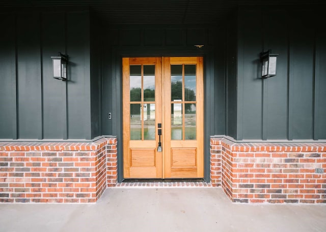 entrance to property featuring french doors