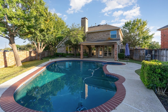 view of pool featuring a patio