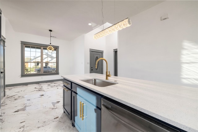 kitchen featuring pendant lighting, dishwasher, and sink