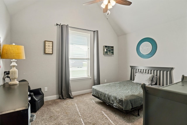 bedroom with light colored carpet, ceiling fan, and lofted ceiling