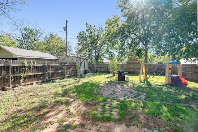 view of yard with a playground