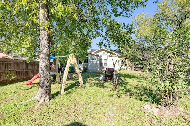 view of yard featuring a playground