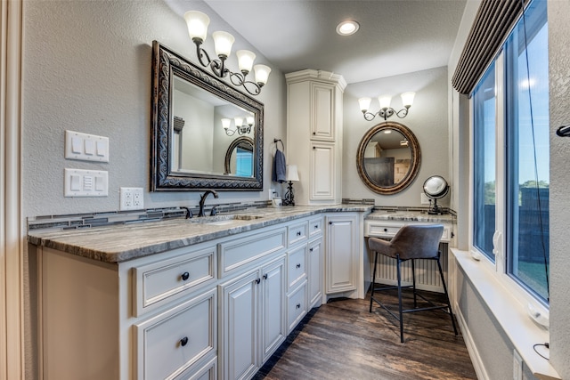 bathroom with vanity and hardwood / wood-style flooring