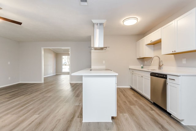 kitchen with island exhaust hood, white cabinets, stainless steel dishwasher, and light wood-type flooring