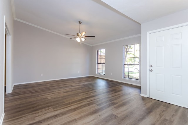 entrance foyer featuring ceiling fan, dark hardwood / wood-style flooring, and ornamental molding