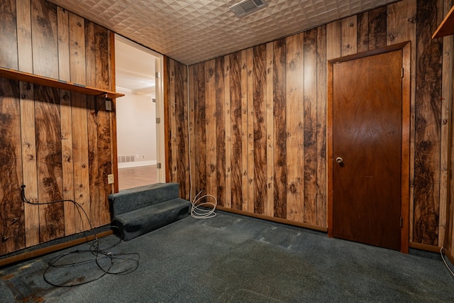 interior space featuring wood walls