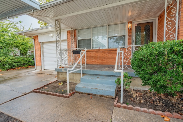 entrance to property with covered porch