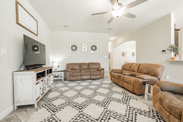 living room featuring ceiling fan