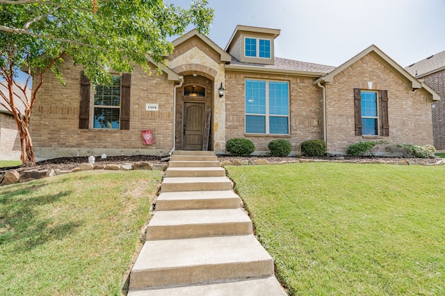 view of front facade with a front yard