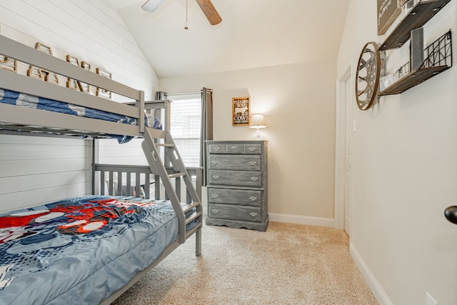 bedroom featuring light carpet, ceiling fan, and lofted ceiling