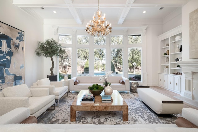 living room featuring coffered ceiling, an inviting chandelier, and beamed ceiling