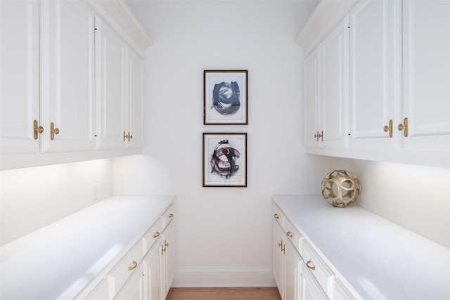 interior space featuring white cabinetry