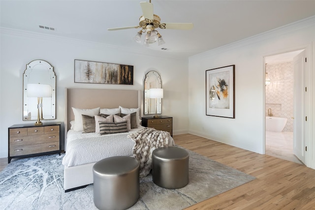 2 Manzano, Dallas, TX 75230 - bedroom featuring crown molding, wood finished floors, baseboards, ensuite bath, and a ceiling fan