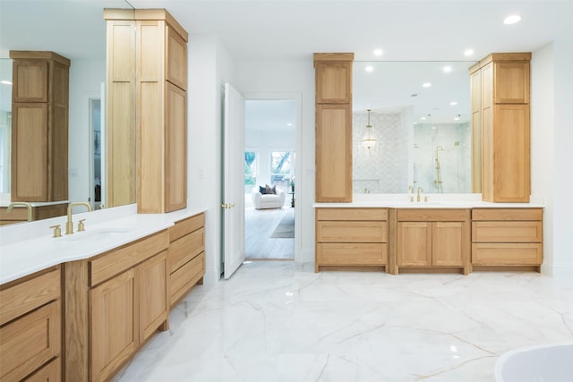 2 Manzano, Dallas, TX 75230 - full bath with marble tiled flooring, recessed lighting, a walk in shower, and two vanities