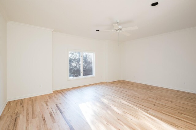 unfurnished room featuring light wood-type flooring, ceiling fan, and ornamental molding