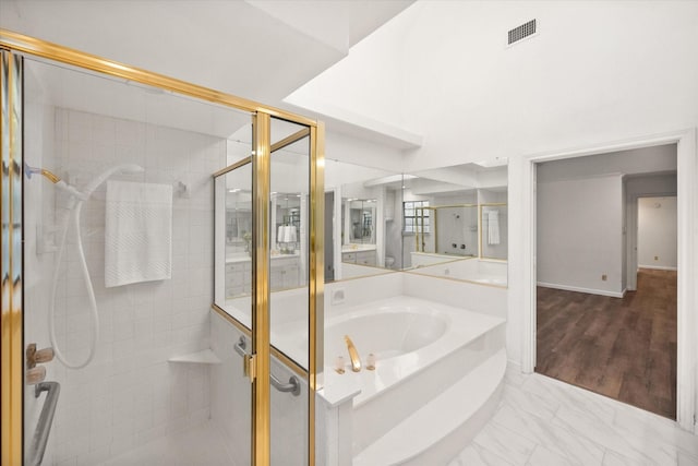 5400 Emerald Park Blvd, Arlington, TX 76017 - bathroom featuring a shower stall and a garden tub
