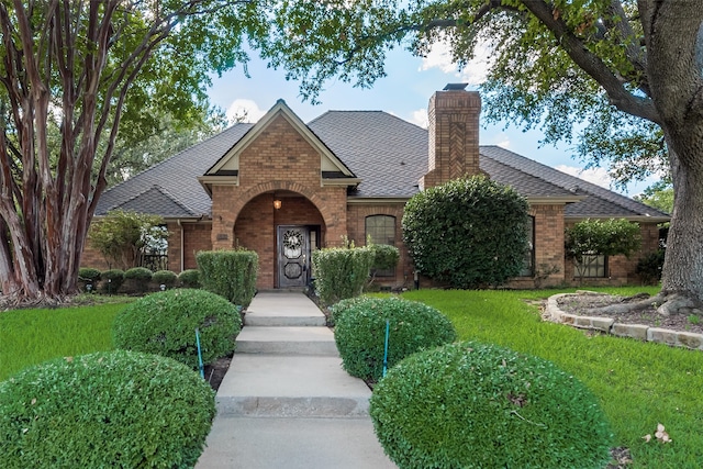 view of front of home with a front yard