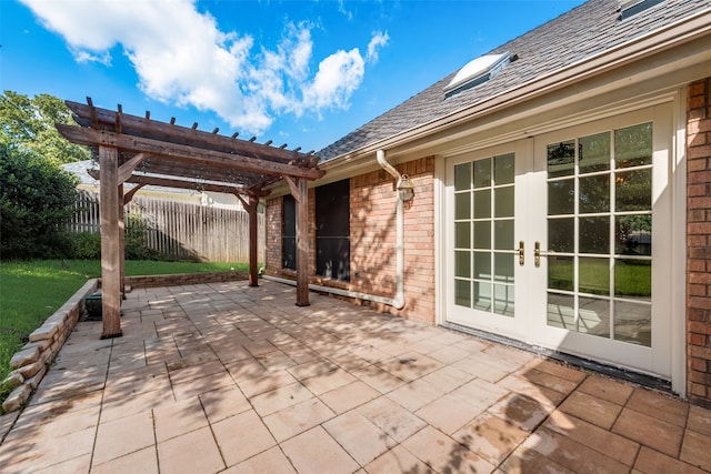 view of patio featuring a pergola and french doors