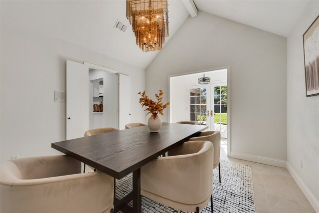 dining area with french doors, beam ceiling, high vaulted ceiling, a chandelier, and light tile patterned flooring