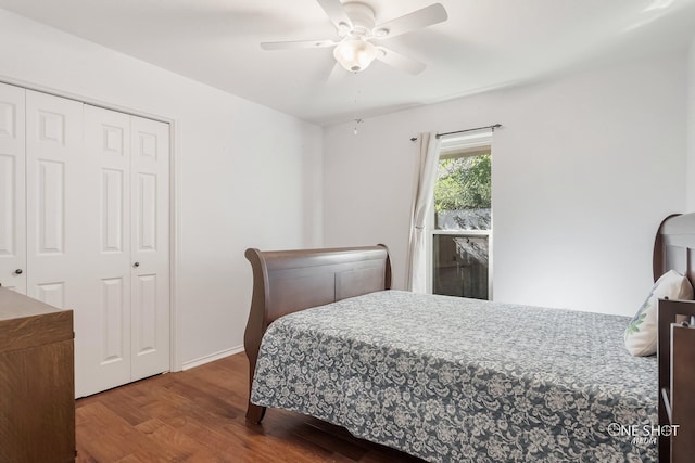 bedroom with hardwood / wood-style floors, ceiling fan, and a closet