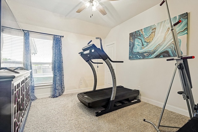 workout room featuring carpet flooring, vaulted ceiling, and ceiling fan