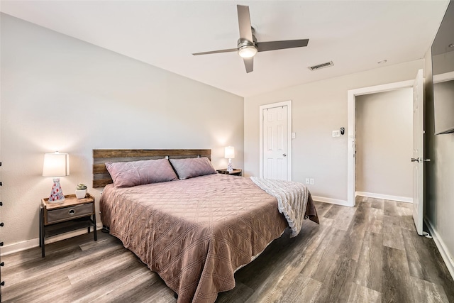 bedroom featuring ceiling fan and hardwood / wood-style floors