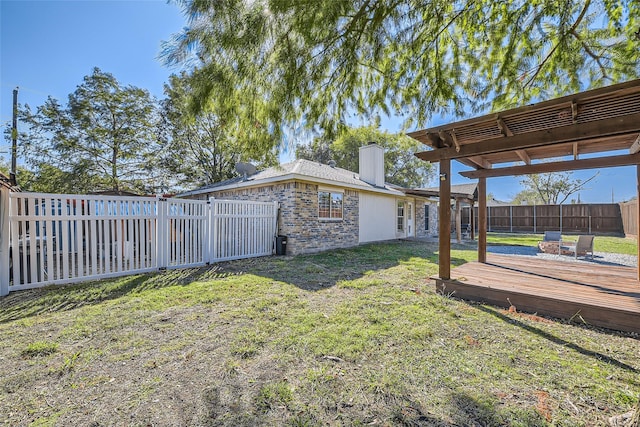 view of yard featuring a wooden deck