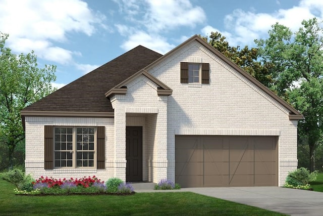 view of front facade featuring a garage and a front lawn