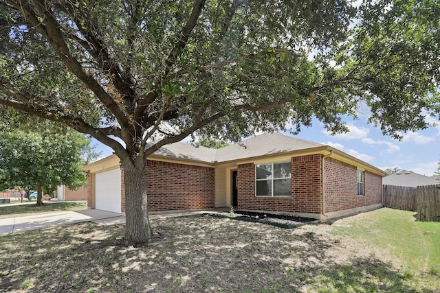 ranch-style house featuring a garage