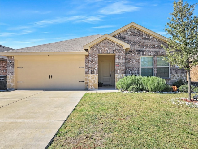 ranch-style home featuring a garage and a front lawn