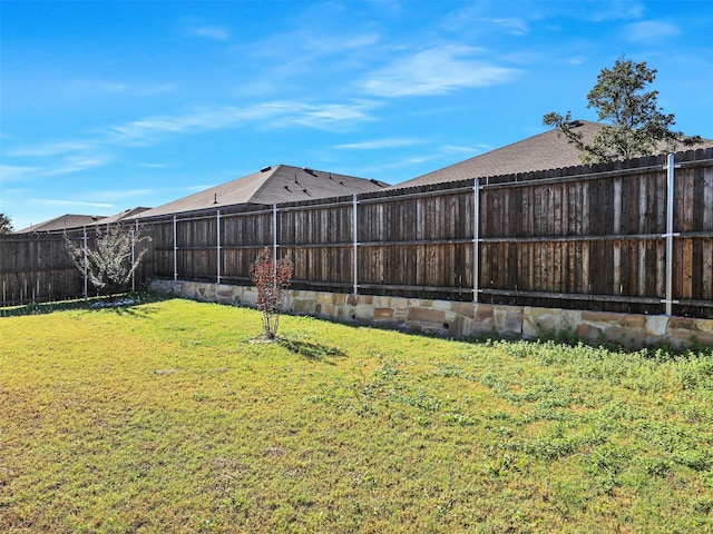 back of property with a patio area and a yard