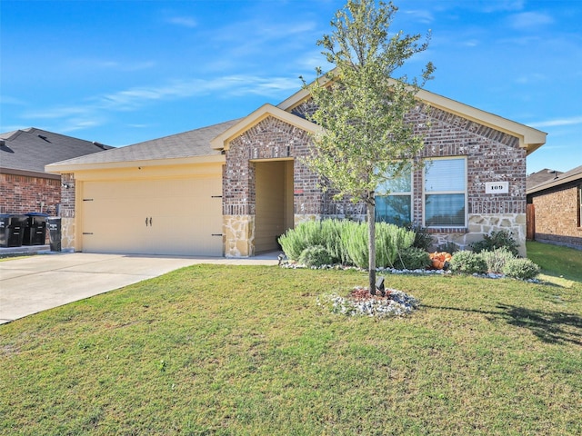 view of front of house with a garage and a front lawn