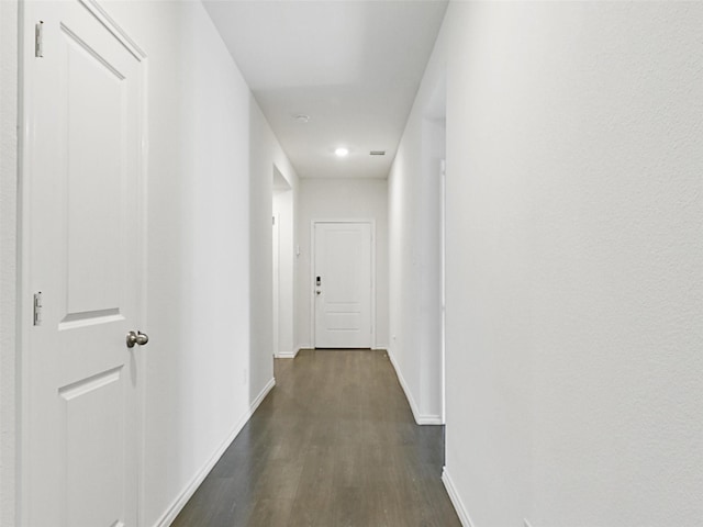 hall featuring dark hardwood / wood-style floors