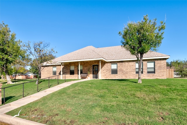 view of front of property with a front lawn