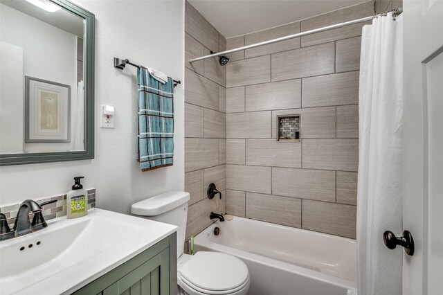 full bathroom with vanity, toilet, and shower / bathtub combination with curtain