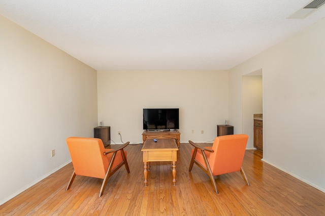 living area featuring light wood-type flooring