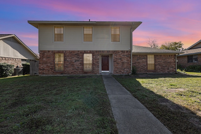 view of property with a lawn